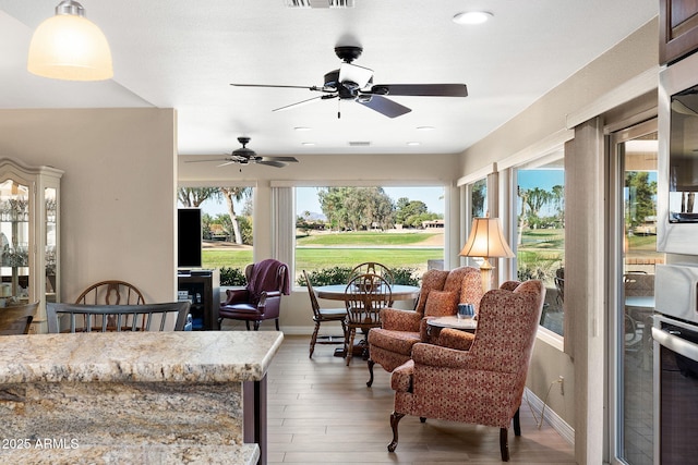 sunroom featuring visible vents