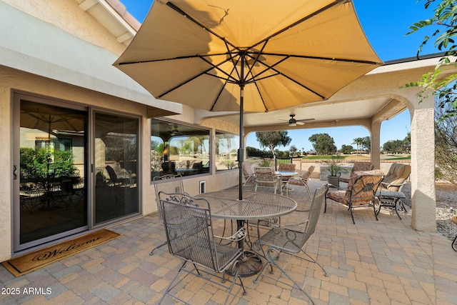 view of patio featuring outdoor dining area