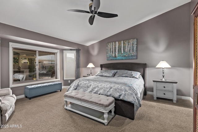 carpeted bedroom featuring vaulted ceiling, a ceiling fan, and baseboards