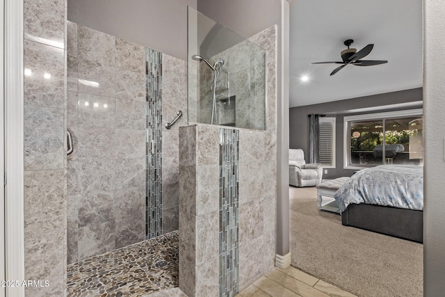 ensuite bathroom with walk in shower, a ceiling fan, and ensuite bathroom