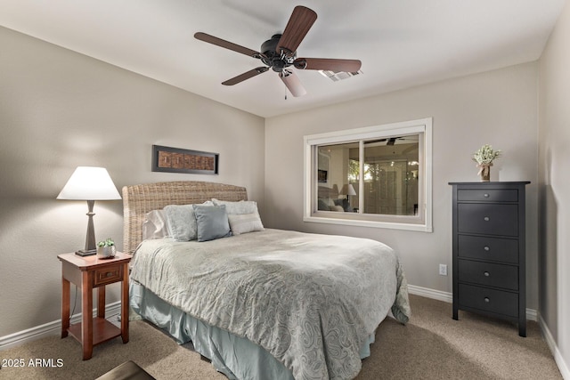 bedroom with a ceiling fan, carpet, visible vents, and baseboards