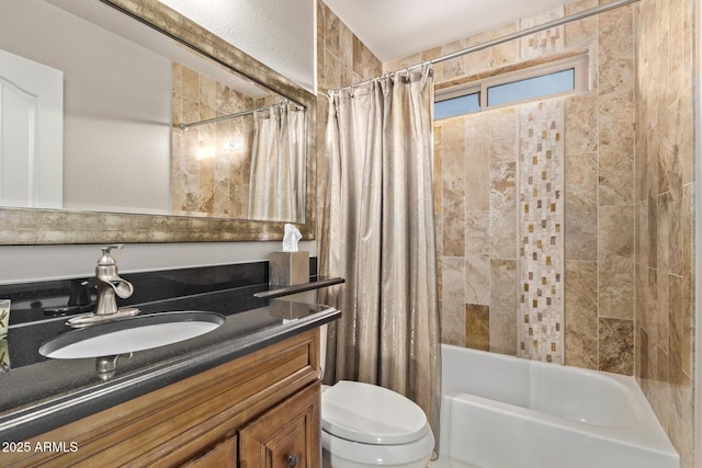 bathroom featuring vanity, toilet, and shower / bath combo with shower curtain