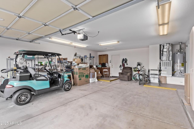 garage with gas water heater and a garage door opener