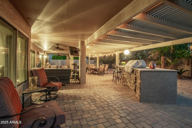 view of patio / terrace featuring an outdoor kitchen, an outdoor hangout area, grilling area, a pergola, and outdoor dining space