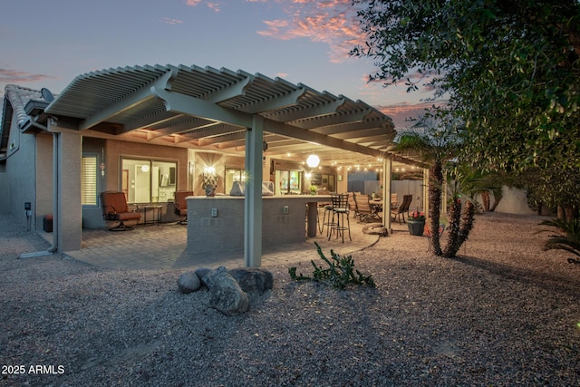 view of patio with fence and a pergola