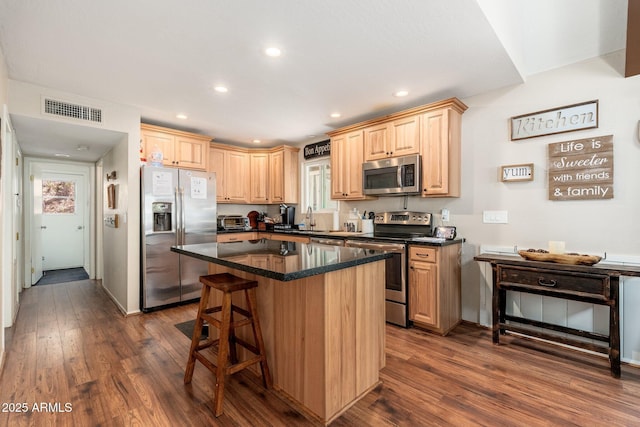 3971 N Apache Trl, Pine, AZ 85544 - kitchen featuring stainless steel appliances, dark wood-style floors, light brown cabinetry, a center island, and recessed lighting