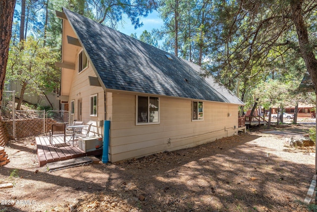 3971 N Apache Trl, Pine, AZ 85544 - view of property exterior featuring a shingled roof and a deck