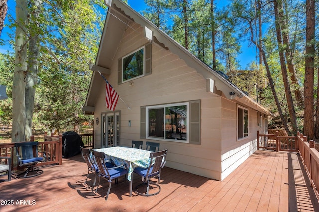 3971 N Apache Trl, Pine, AZ 85544 - wooden deck featuring outdoor dining space and a grill