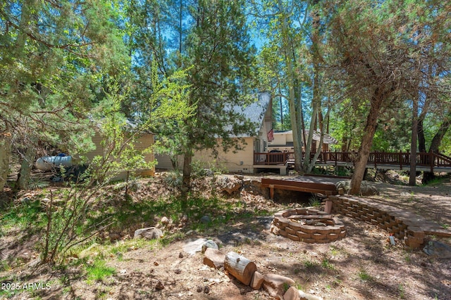3971 N Apache Trl, Pine, AZ 85544 - view of yard with an outdoor fire pit and a wooden deck