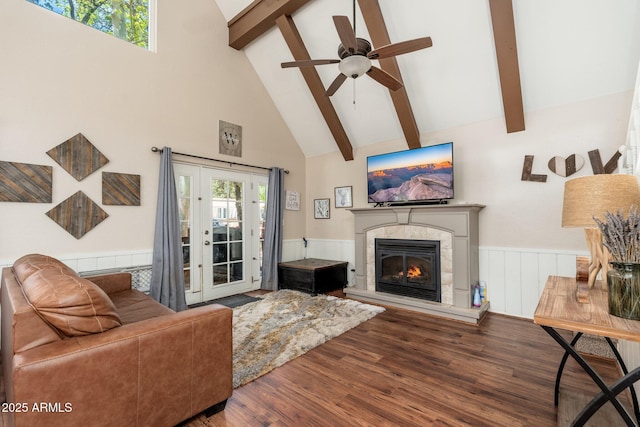 3971 N Apache Trl, Pine, AZ 85544 - living area with high vaulted ceiling, a ceiling fan, a wainscoted wall, beamed ceiling, and wood finished floors