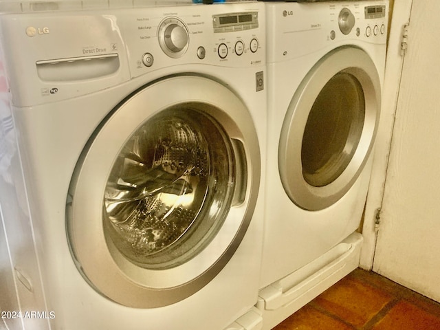 laundry room featuring washing machine and dryer and a mail area