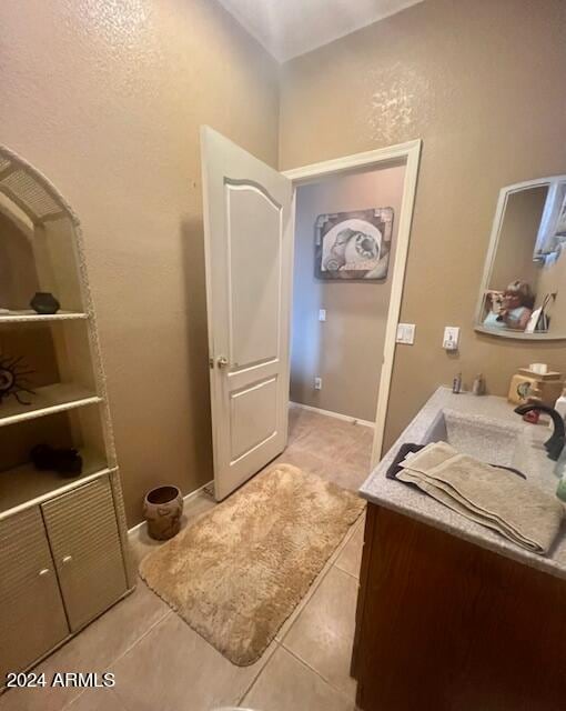 bathroom featuring vanity and tile patterned floors