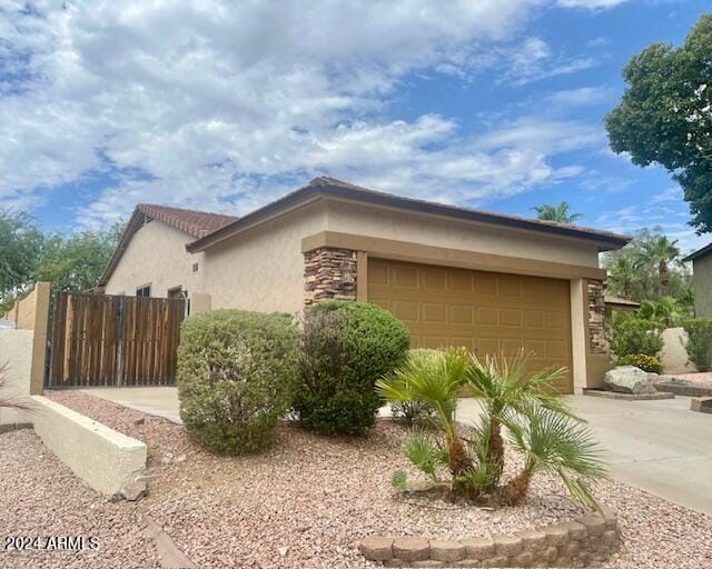 view of side of property with a garage