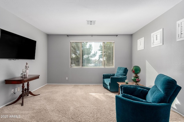 living area with carpet floors