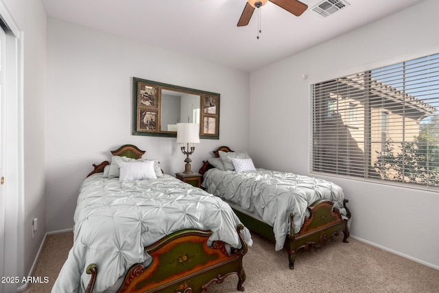 bedroom with light carpet and ceiling fan