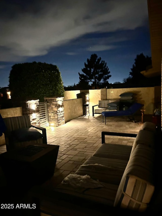 view of patio at night
