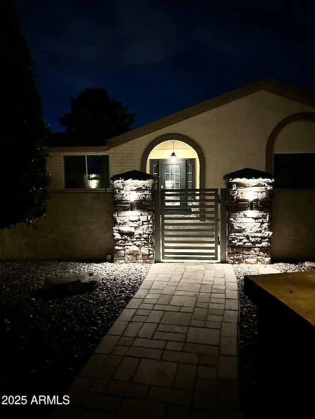 patio at twilight with a gate