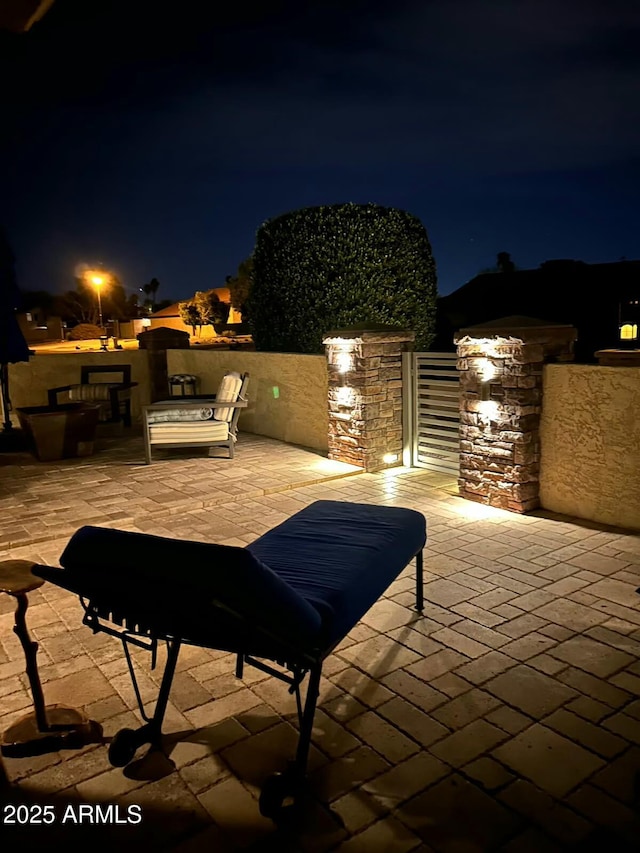 view of patio at night