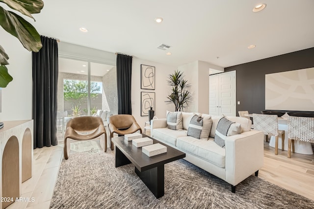 living room with light hardwood / wood-style floors