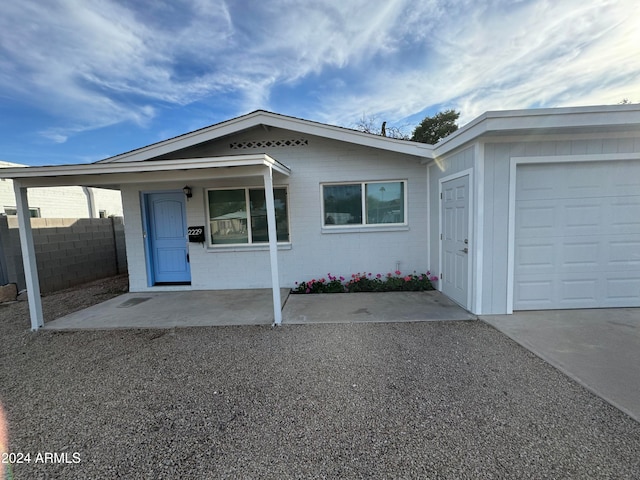 view of front of property with a garage