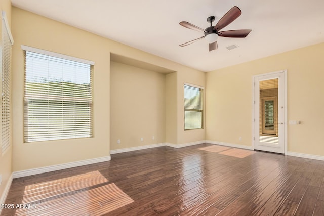 26796 N 86th Ln, Peoria, AZ 85383 - unfurnished room with a ceiling fan, wood finished floors, plenty of natural light, and visible vents