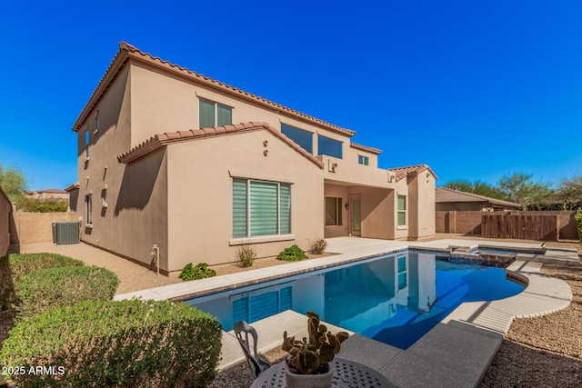 26796 N 86th Ln, Peoria, AZ 85383 - back of house featuring stucco siding, central AC, a tiled roof, and a fenced backyard