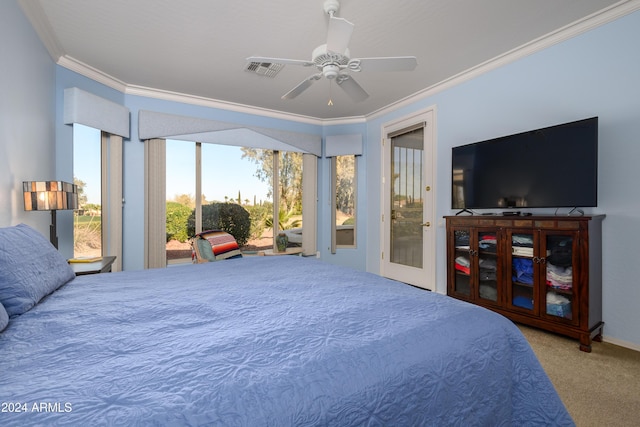 carpeted bedroom with ceiling fan, access to exterior, and ornamental molding