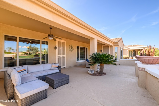 view of patio featuring an outdoor hangout area and ceiling fan