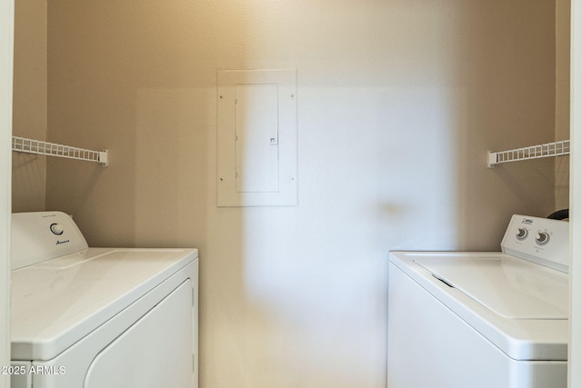 5345 E Van Buren St Unit 305, Phoenix, AZ 85008 - laundry area featuring washing machine and dryer and electric panel