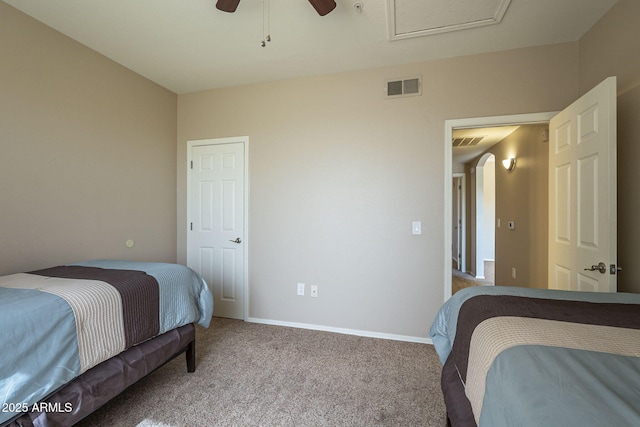 5345 E Van Buren St Unit 305, Phoenix, AZ 85008 - carpeted bedroom with ceiling fan and baseboards