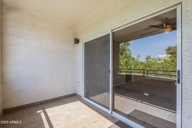 5345 E Van Buren St Unit 305, Phoenix, AZ 85008 - doorway to property featuring a balcony and stucco siding