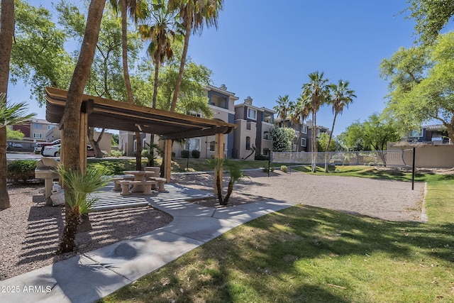 5345 E Van Buren St Unit 305, Phoenix, AZ 85008 - view of home's community with volleyball court, a yard, and a residential view