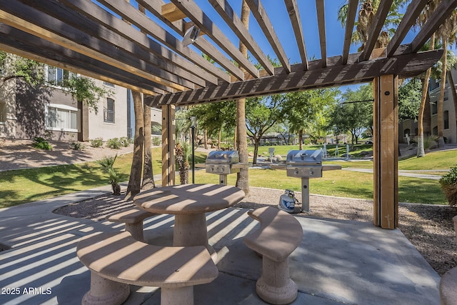 5345 E Van Buren St Unit 305, Phoenix, AZ 85008 - view of patio / terrace with a pergola and grilling area