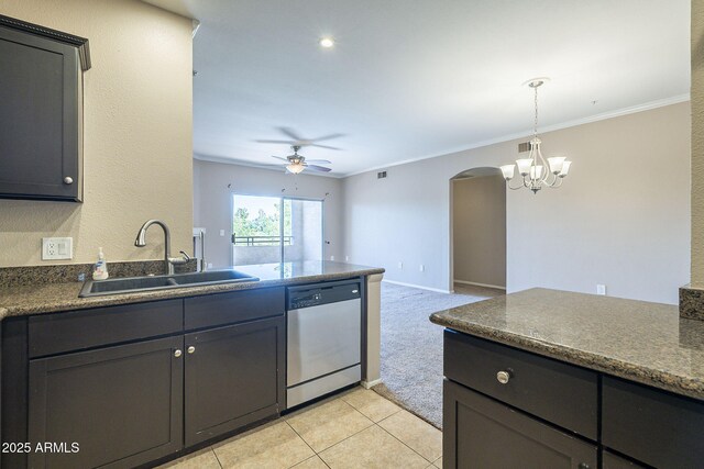 5345 E Van Buren St Unit 305, Phoenix, AZ 85008 - kitchen with dishwasher, a sink, arched walkways, ceiling fan, and dark countertops