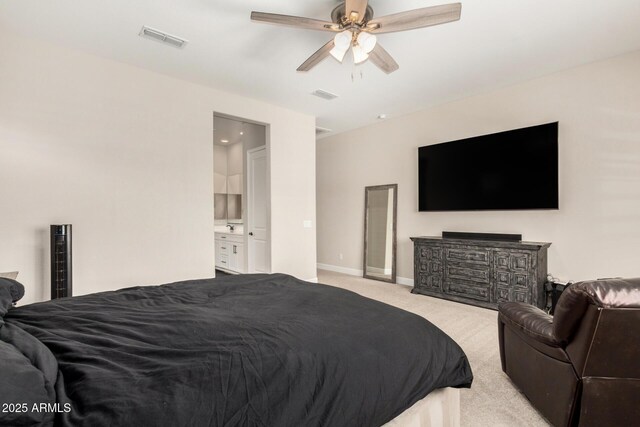 5314 N 182nd Ln, Litchfield Park, AZ 85340 - bedroom featuring carpet, ensuite bath, and ceiling fan