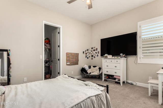 5314 N 182nd Ln, Litchfield Park, AZ 85340 - bedroom featuring carpet floors, ceiling fan, and a spacious closet