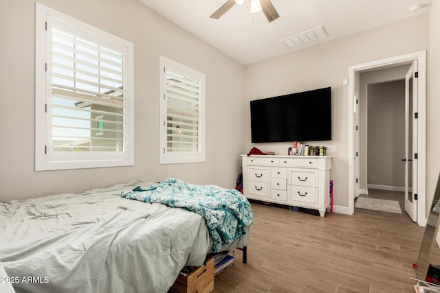 5314 N 182nd Ln, Litchfield Park, AZ 85340 - bedroom featuring wood finished floors and a ceiling fan