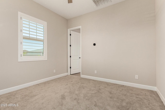 5314 N 182nd Ln, Litchfield Park, AZ 85340 - carpeted spare room with baseboards and a ceiling fan