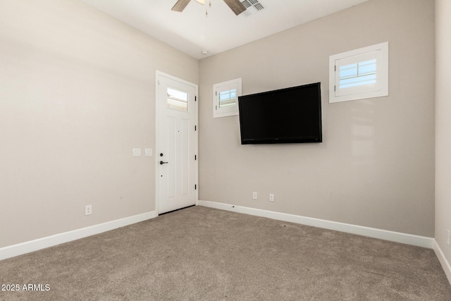 5314 N 182nd Ln, Litchfield Park, AZ 85340 - empty room featuring a ceiling fan and carpet flooring