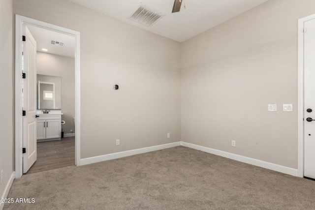 5314 N 182nd Ln, Litchfield Park, AZ 85340 - unfurnished room featuring light carpet and ceiling fan