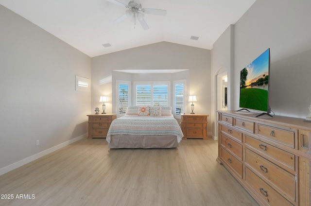 bedroom featuring lofted ceiling, light hardwood / wood-style floors, and ceiling fan