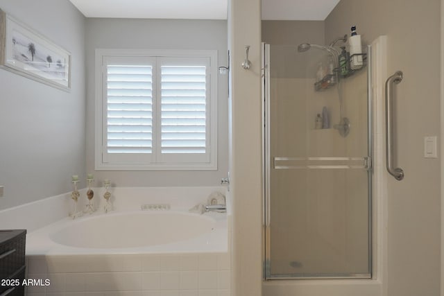 bathroom with vanity and separate shower and tub