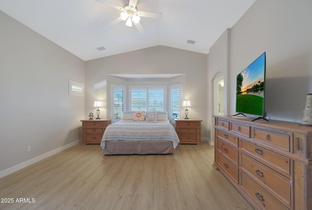 bedroom featuring lofted ceiling, light hardwood / wood-style floors, and ceiling fan