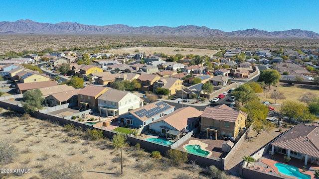 drone / aerial view featuring a mountain view