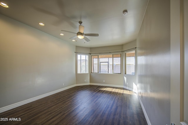 710 W Ardmore Rd, Phoenix, AZ 85041 - unfurnished room featuring dark wood-type flooring, a ceiling fan, recessed lighting, baseboards, and a smoke detector