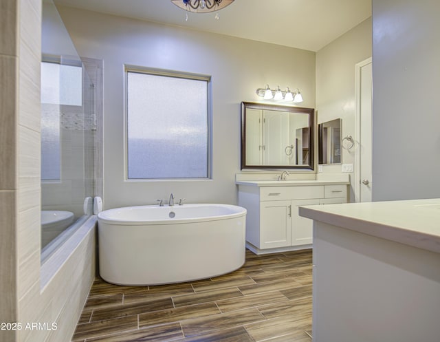 710 W Ardmore Rd, Phoenix, AZ 85041 - full bathroom with vanity, a freestanding bath, and a tile shower