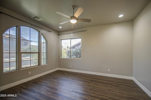 710 W Ardmore Rd, Phoenix, AZ 85041 - unfurnished room with dark wood-style floors, baseboards, recessed lighting, and ceiling fan