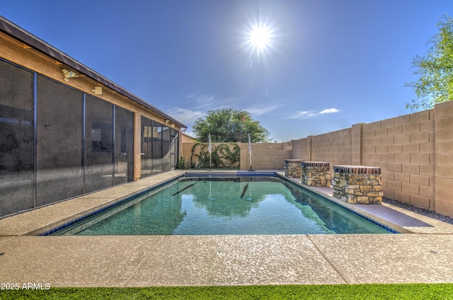 710 W Ardmore Rd, Phoenix, AZ 85041 - view of pool featuring a sunroom, a fenced backyard, and a patio