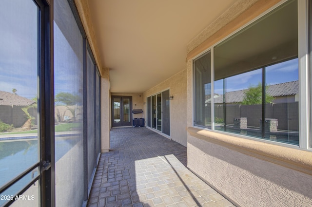 710 W Ardmore Rd, Phoenix, AZ 85041 - unfurnished sunroom with brick floors