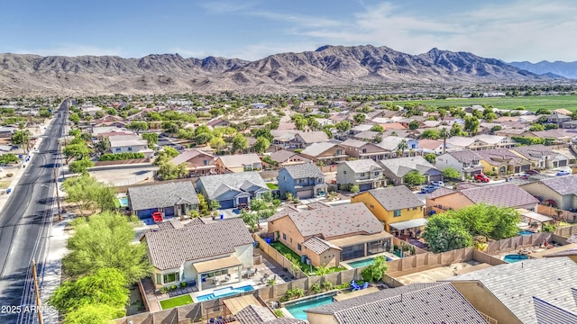 710 W Ardmore Rd, Phoenix, AZ 85041 - aerial view of residential area featuring a mountain backdrop and a pool area